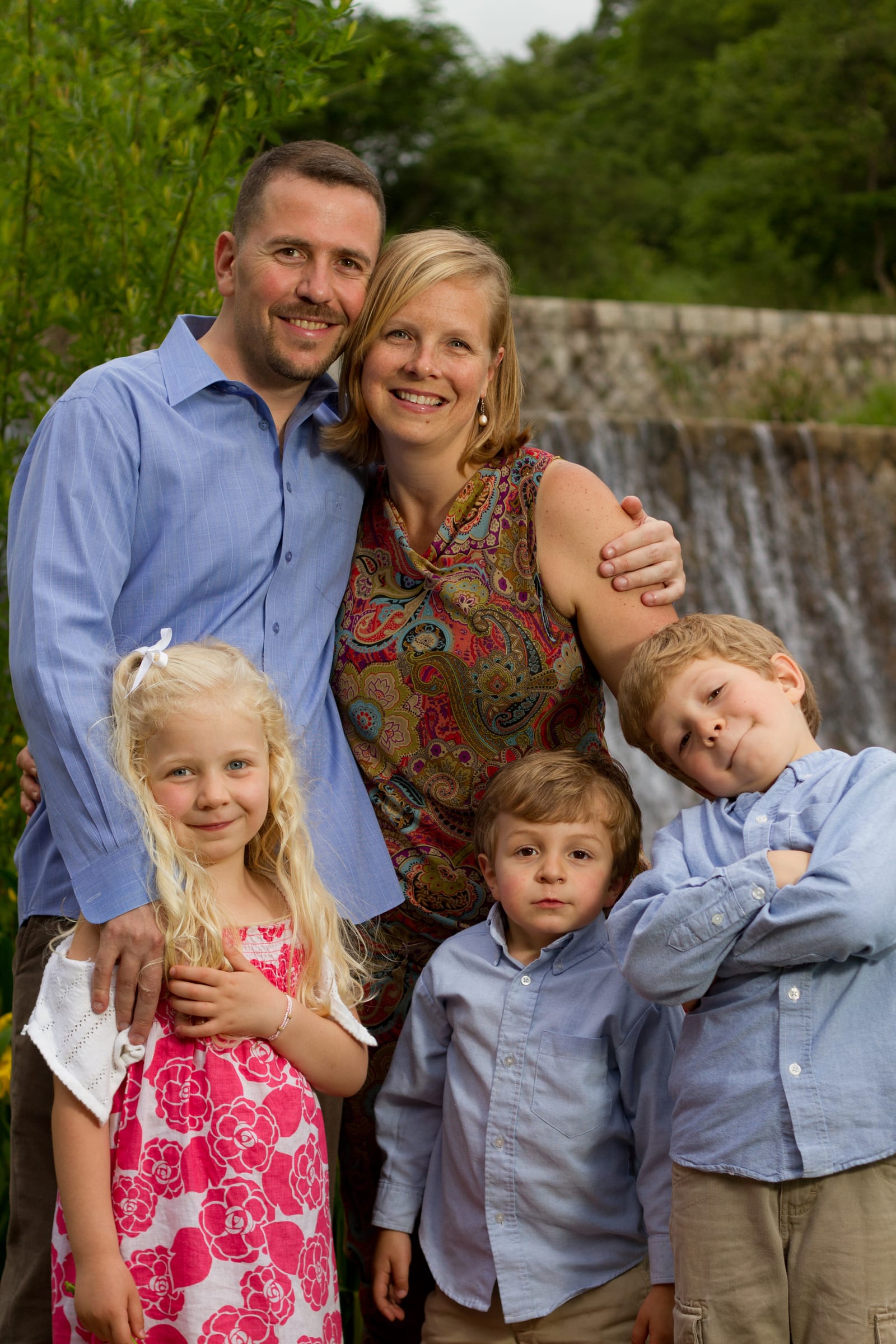 Family portrait near a waterfall