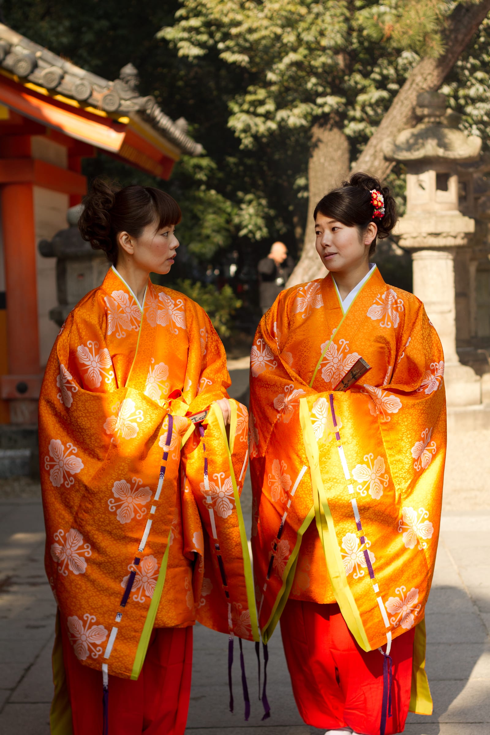 Two women in traditional kimono walking together in Japan